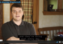 Video capture - Cayden sits in his house while being interviewed about his journey.
